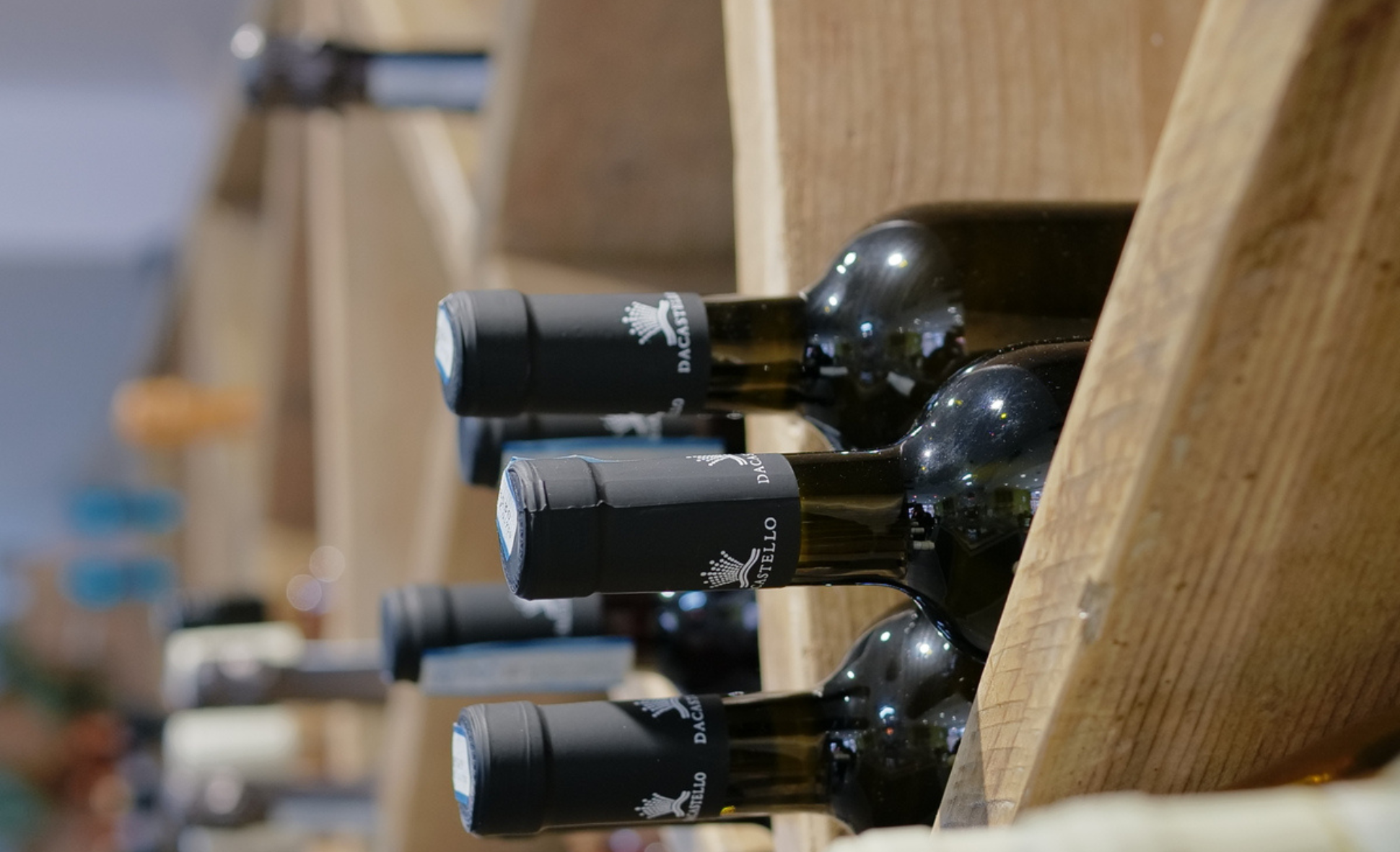 Red wine bottles in a wine rack
