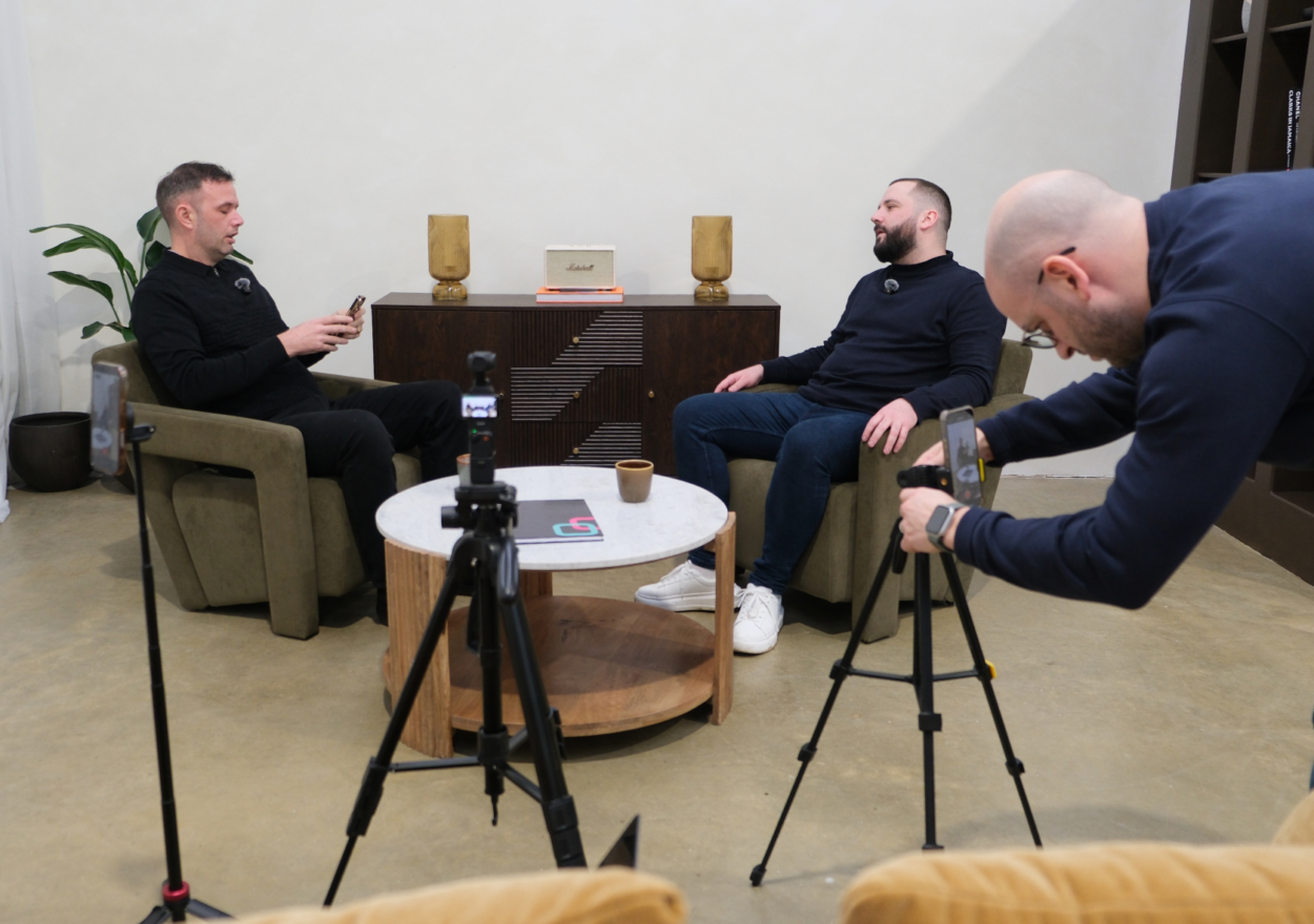 Michael Line of JTR Collections interviews Adam Franklin, as Ryan Percival sets up camera equipment